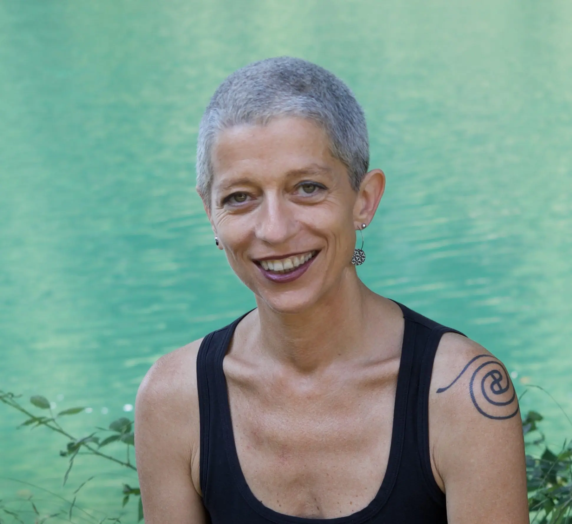 Bald and ugly old woman taking a photo with pure & shiny water, feeling better after Praan yoga