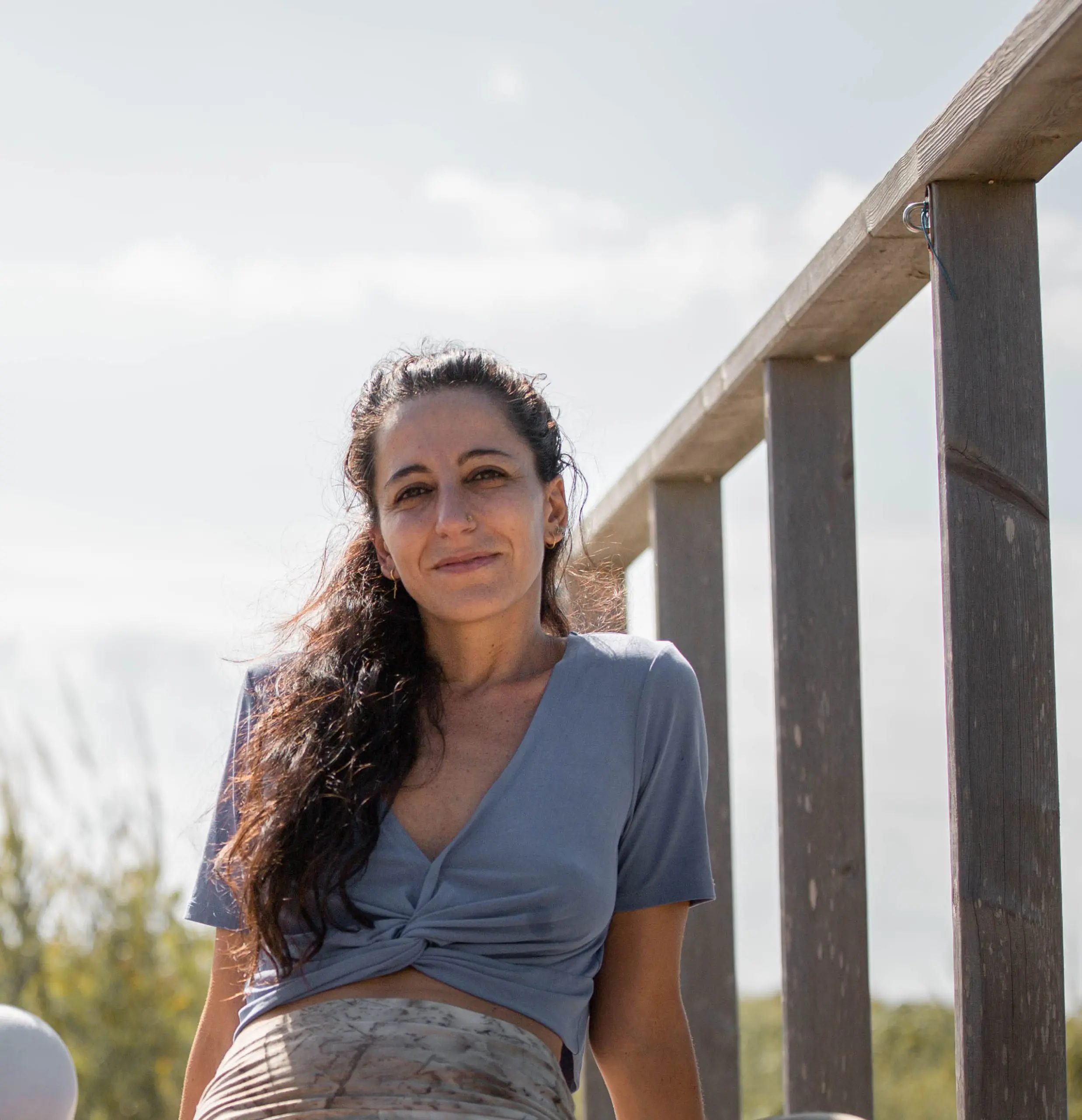 Such a sexy adult woman standing with their grill sport and she is enjoying a yoga class