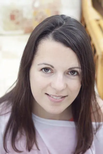 An aesthetic chiropractic female instructor, her hair is long & silky looking handsome eyes