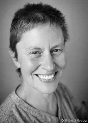 A transgender woman is feeling very Happiness after having a yoga