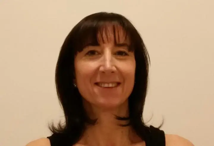 A 35-year-old woman very happy, after Hatha yoga, feeling happy