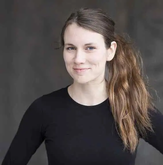 Such a beautiful young girl wearing a T-shirt looking very handsome