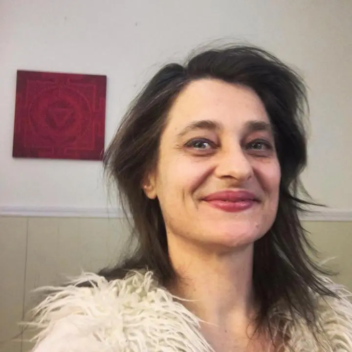 Laughing girl with an ugly smile in the massage room