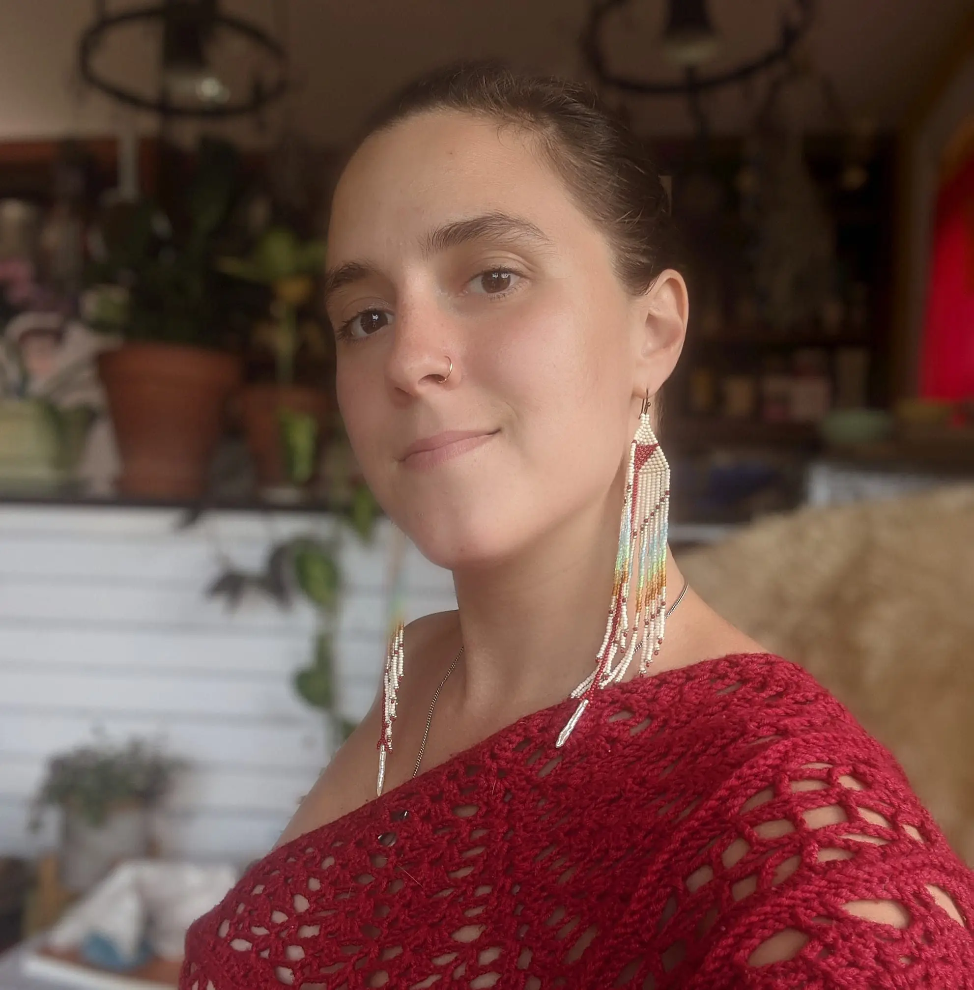 Such an aesthetic girl wearing Jhumke & sexy red jersey, surrounded by a textured background