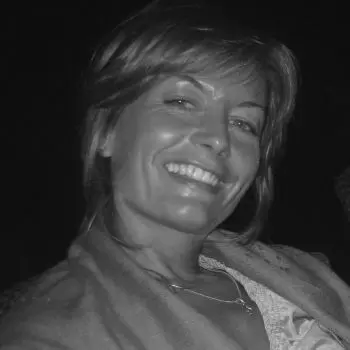 In a black, and white photo, a 35-year-old woman | Woman Yoga Therapy