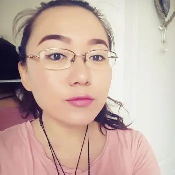 A Chinese young female yoga instructor