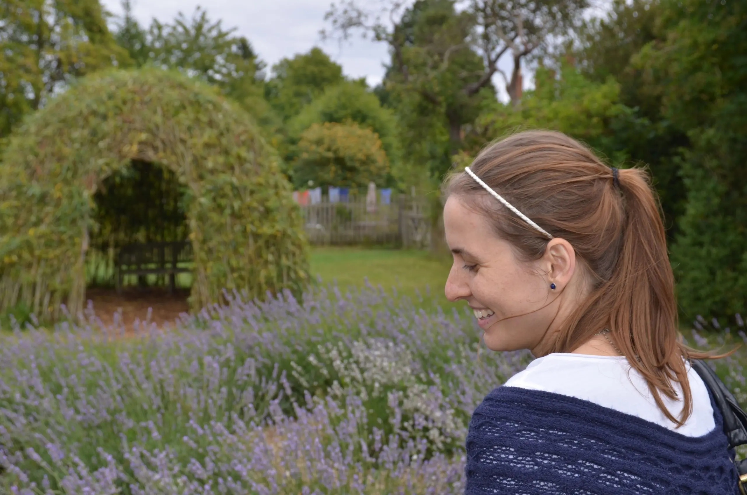 A young girl enjoying with followers in the front of a Thai massage hut