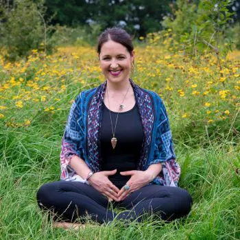 An attractive girl sitting with Fire Log Pose
