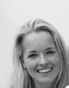 A young lady meditative smiling pose, surrounded by a textured background