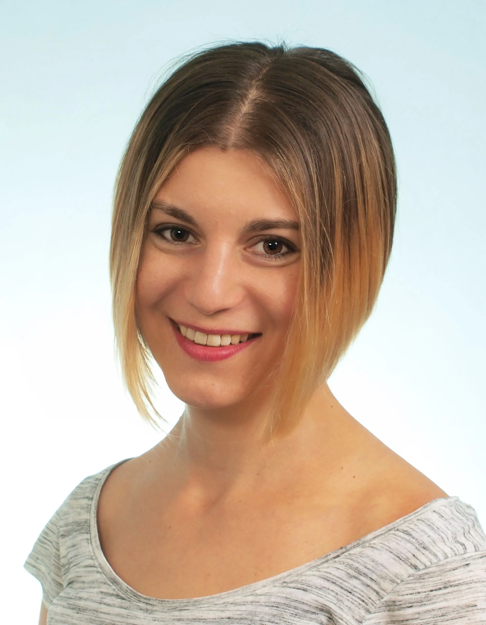 An aesthetic smile adult girl wearing a yoga dress