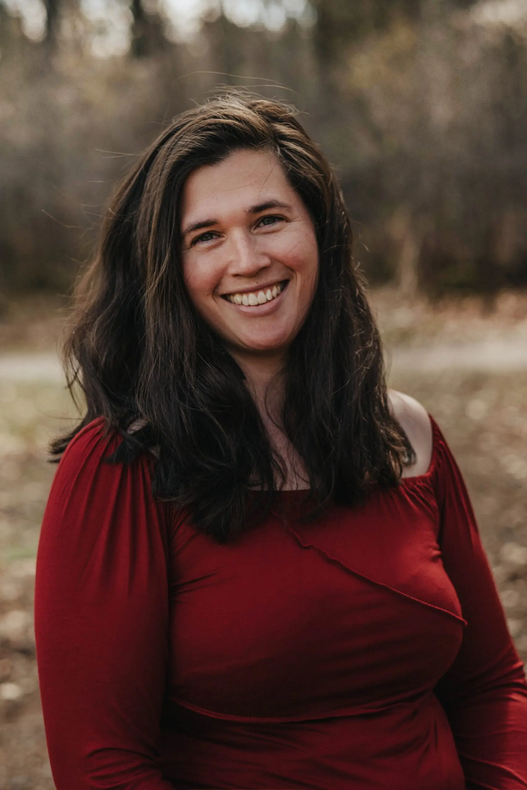 A lovely yoga teacher wearing a red dress to look awesome