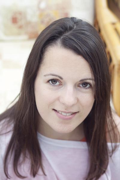 An aesthetic chiropractic female instructor, her hair is long & silky looking handsome eyes