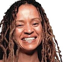 A 40+-year-old woman smiling in the yoga Nidra house, with a white background