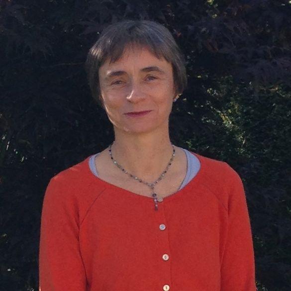 A Japanese woman who has little hair and wears a red shirt wants a house of yoga