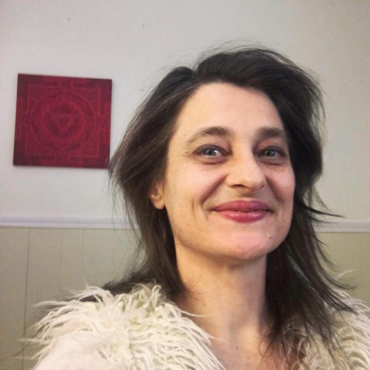 Laughing girl with an ugly smile in the massage room